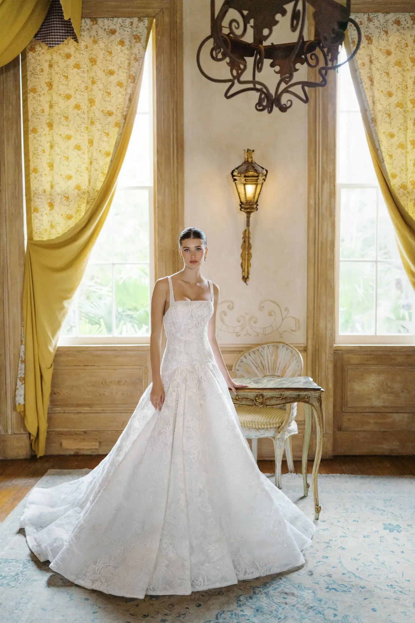 model is wearing a drop waist bridal gown