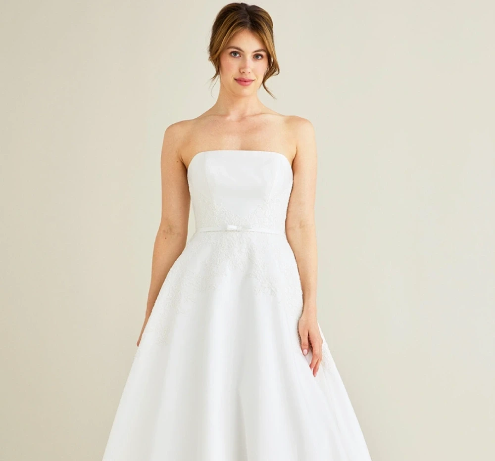 Model wearing a Lea-Ann Belter Bridal Gown