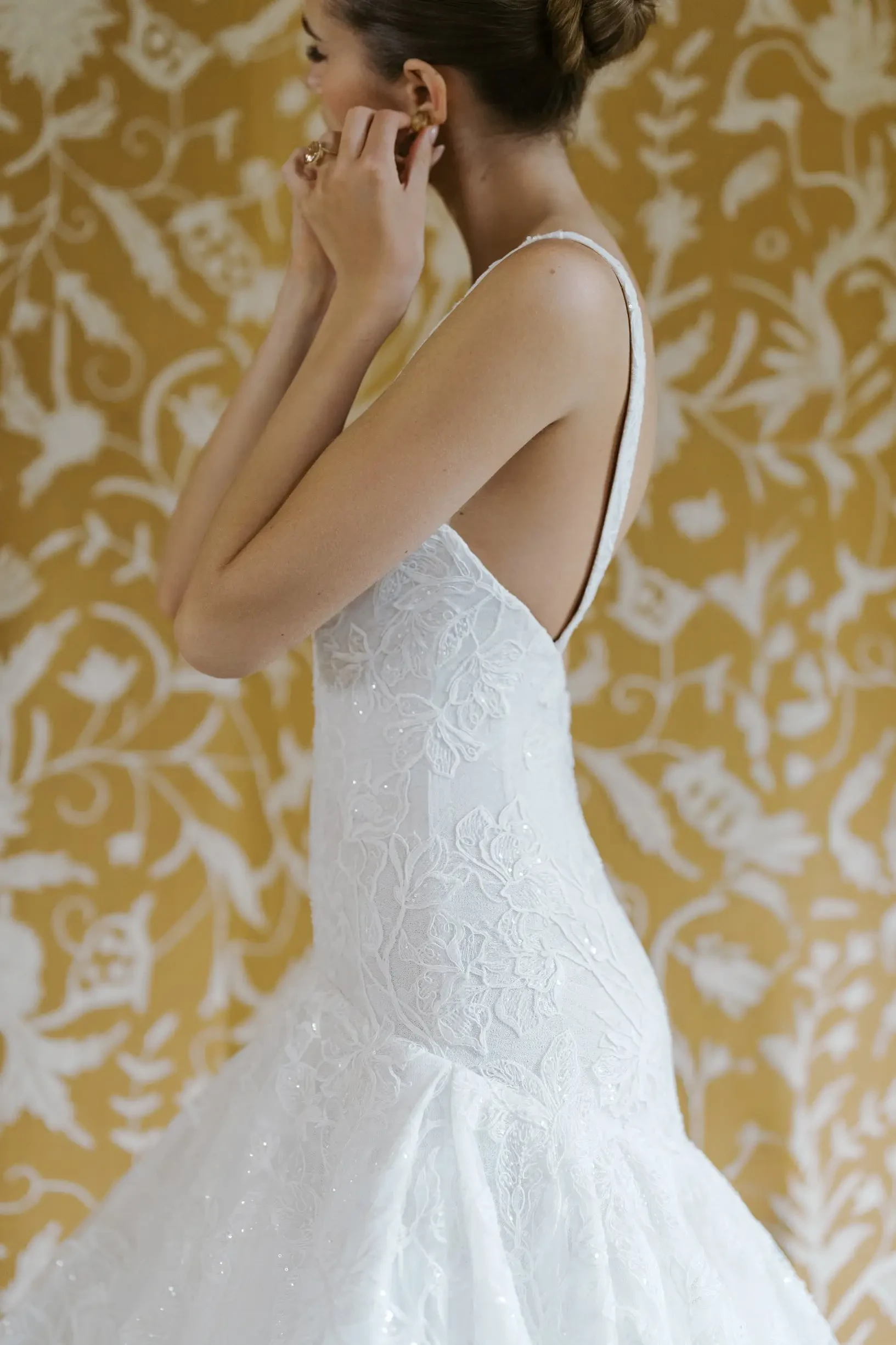 model is wearing a drop waist bridal gown