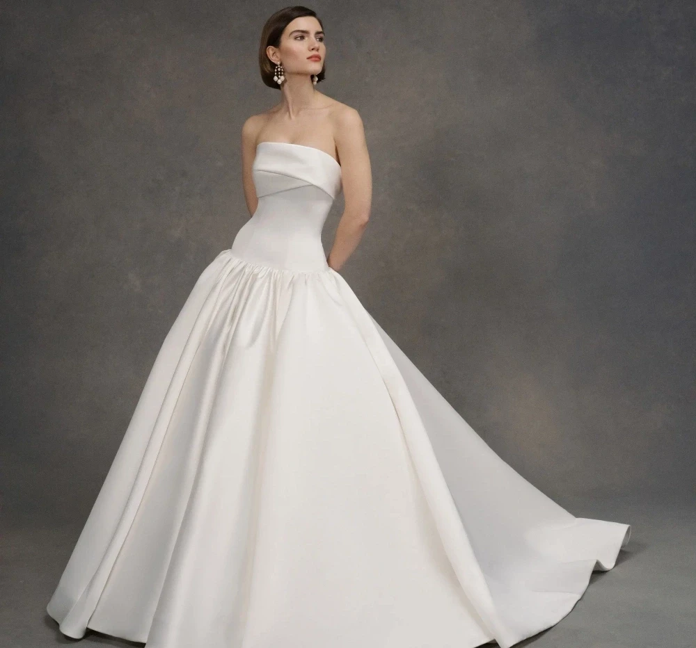 Model wearing a Anne Barge Bridal Gown